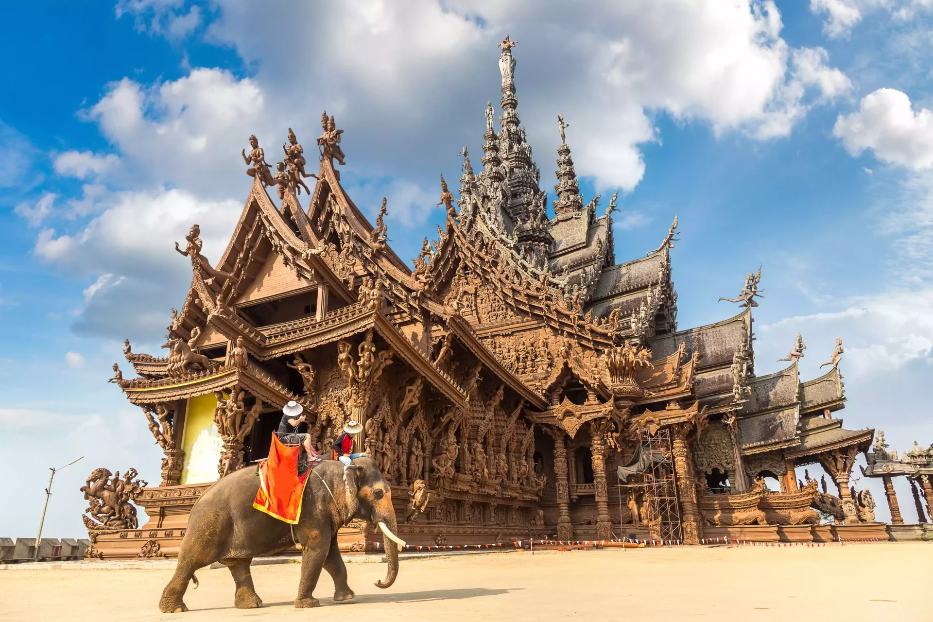 tourists-ride-elephant-around-sanctuary-truth-pattaya-thailand
